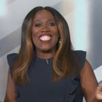 Sheryl’s navy ruffle top on The Talk