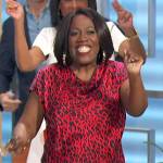 Sheryl’s red leopard drape top and pants on The Talk