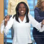 Sheryl’s white fringe cuff blouse on The Talk
