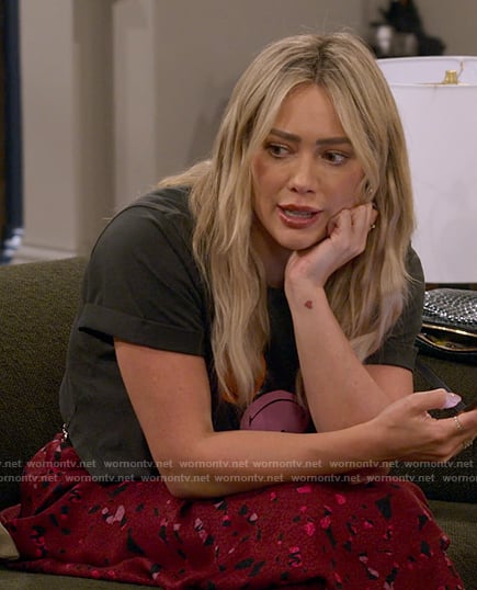 Sophie’s smiley face tee and red printed midi skirt on How I Met Your Father
