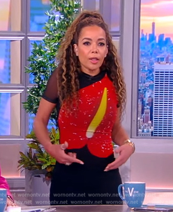 Sunny’s black anthurium mesh dress on The View