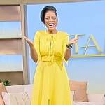 Tamron’s yellow tie front dress on Tamron Hall Show