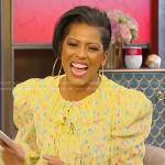 Tamron’s yellow floral ruffle mini dress on Tamron Hall Show