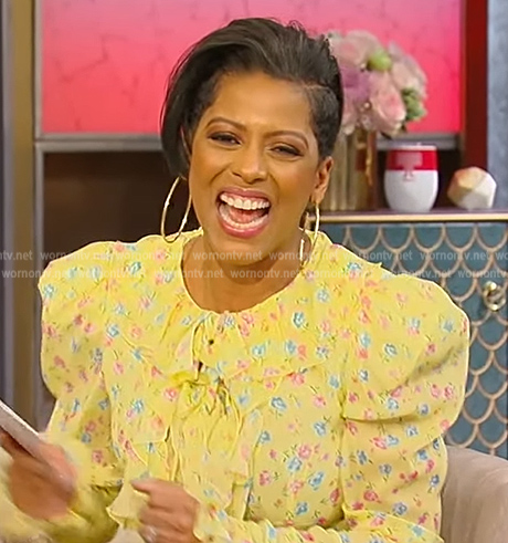 Tamron’s yellow floral ruffle mini dress on Tamron Hall Show