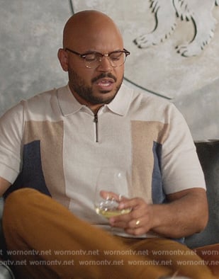Wyatt’s beige polo on Grand Crew