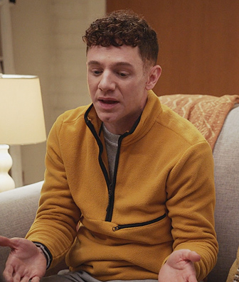 Jacob’s yellow fleece sweater on Abbott Elementary