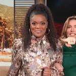 Yvette Nicole Brown’s brown floral tie neck blouse on Access Hollywood