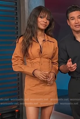 Zuri’s tanned lace-up detail mini dress on Access Hollywood