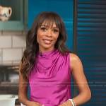 Zuri’s fuchsia sleeveless satin top on Access Hollywood
