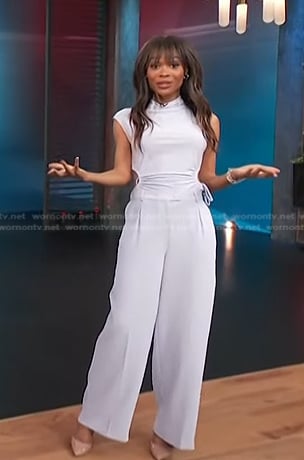 Zuri’s pale lavender cutout top and wide leg pants on Access Hollywood