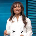 Zuri’s white star cutout shirt on Access Hollywood
