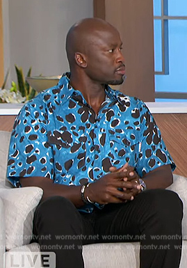 Akbar’s blue leopard print shirt on The Talk