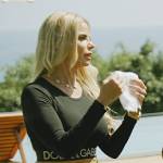 Alexia’s black Dolce and Gabbana logo top and leggings on The Real Housewives Ultimate Girls Trip