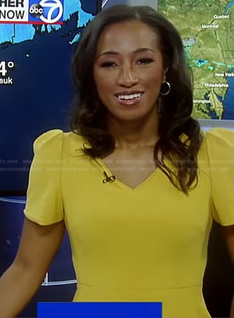 Brittany Bell’s yellow v-neck dress on Good Morning America