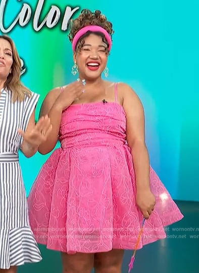 Courtney Quinn’s pink lace mini dress on Access Hollywood