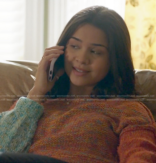 Dana’s colorblock sweater on True Lies