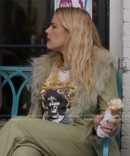Darby’s green leather jacket with fur collar and Rod Stewart tee on Single Drunk Female