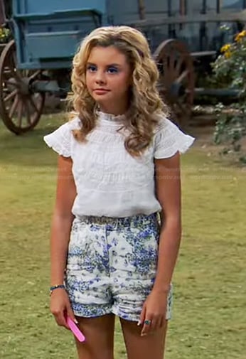 Destiny’s white ruffle top and floral shorts on Bunkd