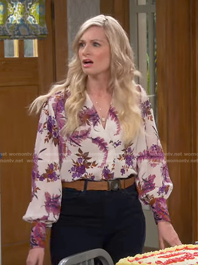 Gemma’s purple floral blouse on The Neighborhood