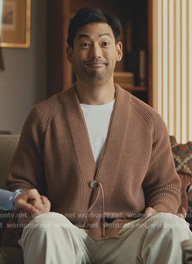 George’s orange knit cardigan on Beef