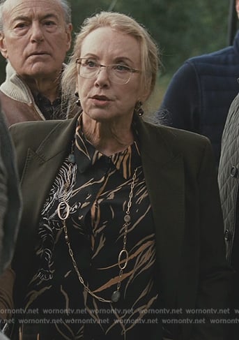 Gerri’s black tiger print blouse on Succession