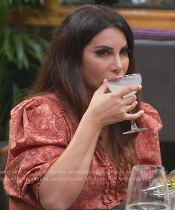 Jennifer’s red floral print ruffle dress on The Real Housewives of New Jersey