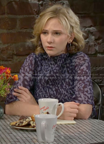 Lucy’s blue printed smocked top on The Young and the Restless