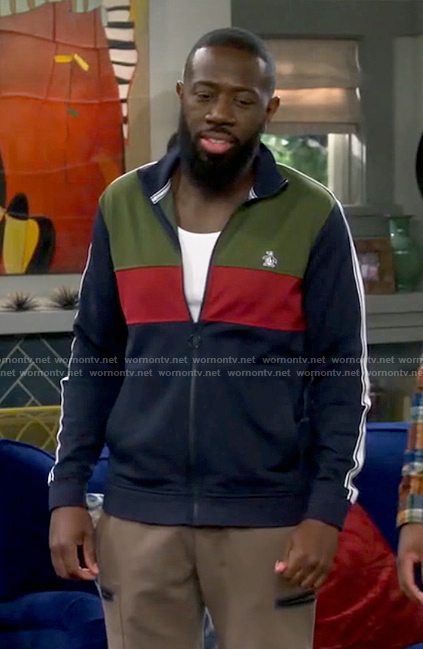 Malcolm’s colorblock track jacket on The Neighborhod