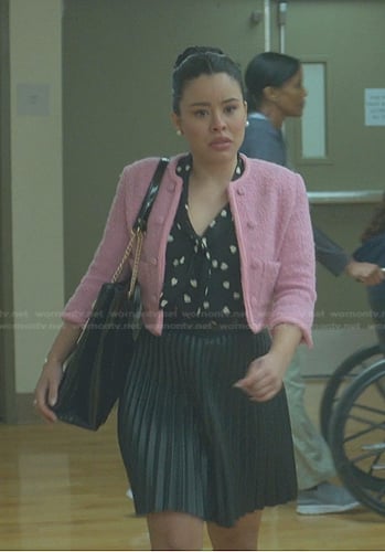 Mariana’s black heart print top and pink jacket on Good Trouble