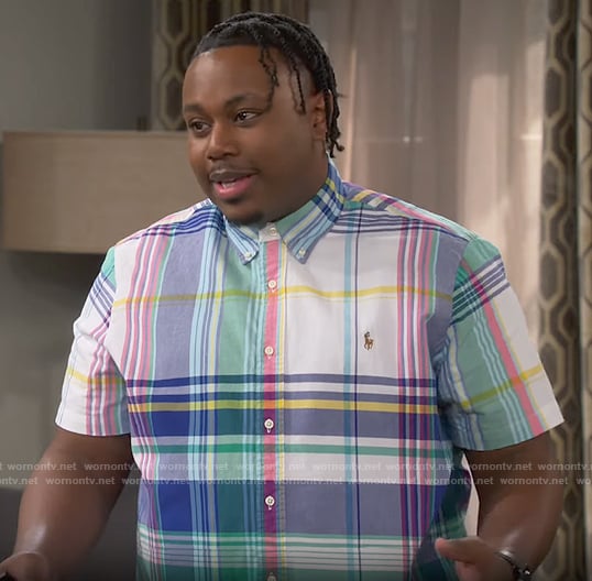 Marty’s multi color plaid shirt on The Neighborhood