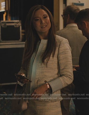 Naomi’s blue tweed denim trim jacket and skirt on Beef