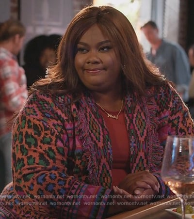 Nicky’s purple mixed print cardigan on Grand Crew