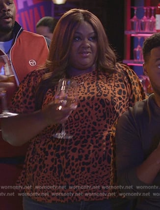 Nicky’s leopard print peplum top on Grand Crew