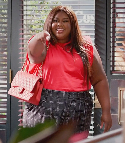 Nicky’s red quilted bag on Grand Crew