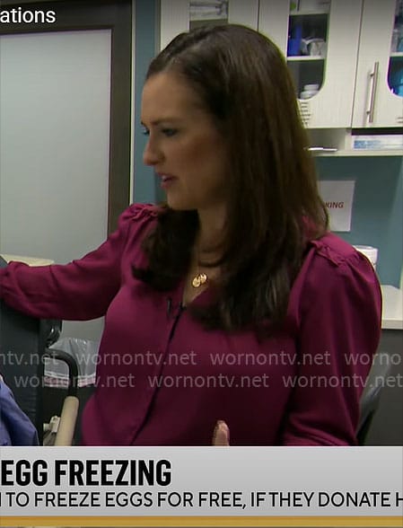 Nikki Battiste’s pink v-neck top on CBS Mornings