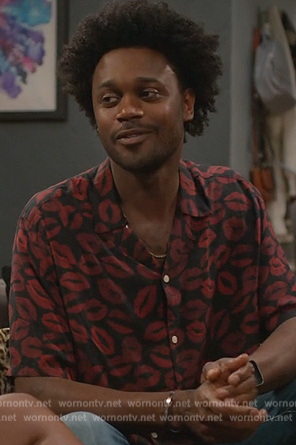 Noah’s black lip print shirt on Grand Crew