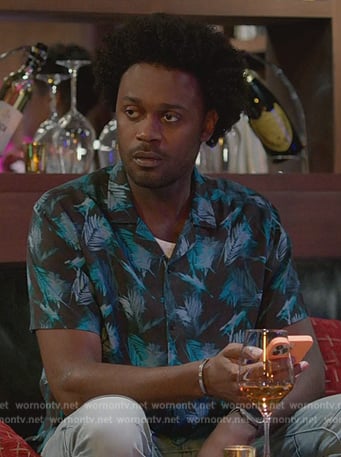 Noah’s black leaf print shirt on Grand Crew
