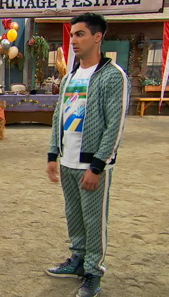 Parker’s graphic print tee and green geometric track jacket on Bunkd
