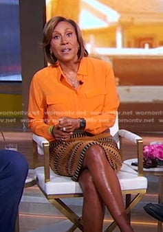 Robin’s orange blouse and brown striped skirt on Good Morning America