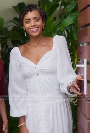 Ruby’s white twist bust dress with smocked waist on Fantasy Island