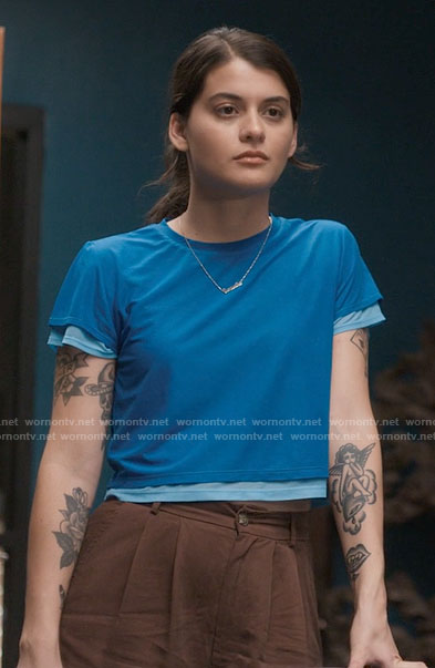 Sam’s blue layered t-shirt and brown pants on Single Drunk Female