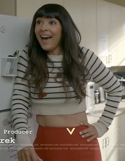 Sam’s striped cherry print sweater and red skirt on Not Dead Yet