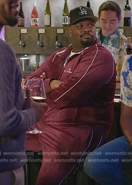 Sherm’s burgundy tracksuit on Grand Crew