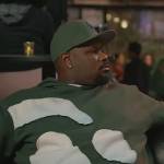Sherm’s green patch work hoodie on Grand Crew