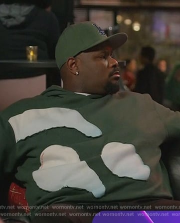 Sherm’s green patch work hoodie on Grand Crew