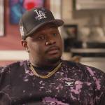 Sherm’s black tie dye sweatshirt on Grand Crew