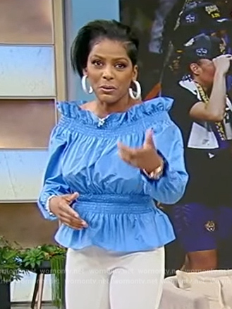 Tamron’s blue ruffle off shoulder top on Tamron Hall Show