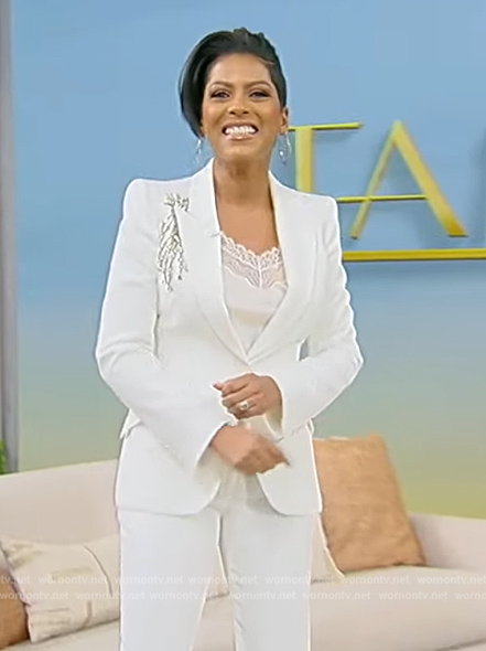 Tamron’s white embellished blazer on Tamron Hall Show
