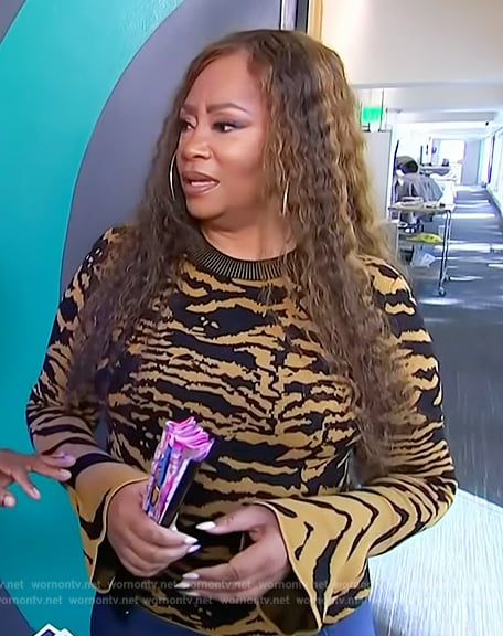 Jody Watley’s tiger stripe sweater on Access Hollywood
