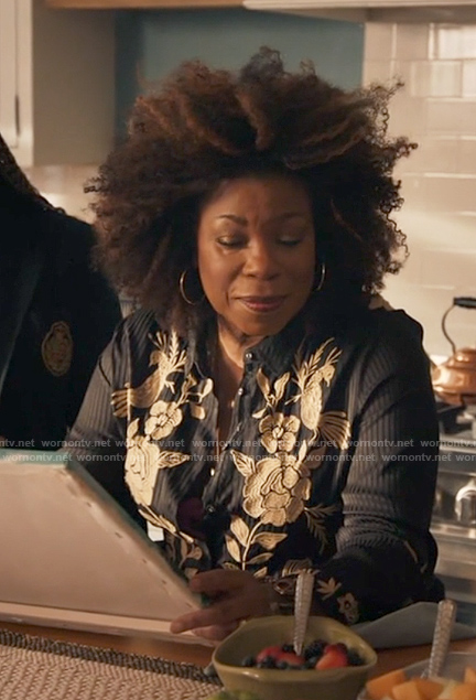 Vi’s black floral embroidered button down top on The Equalizer